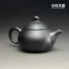 台灣茶器推薦-林永裕手作煙燻黑金茶壺半手工圓潤把手與背面細節