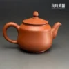 台灣茶器推薦-林永裕手作朱泥茶壺單圈圓弧把手與背面細節
