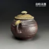 台灣茶具-張家誌手作入炭柴燒壺耳形圓把與背面窯變細節特寫