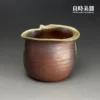 張家誌手作柴燒窯變茶海不規則黃綠結晶流淌與內壁原土肌理特寫