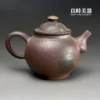 台灣茶器推薦-張家誌手作柴燒窯變龍蛋壺耳形圓把與背面細節