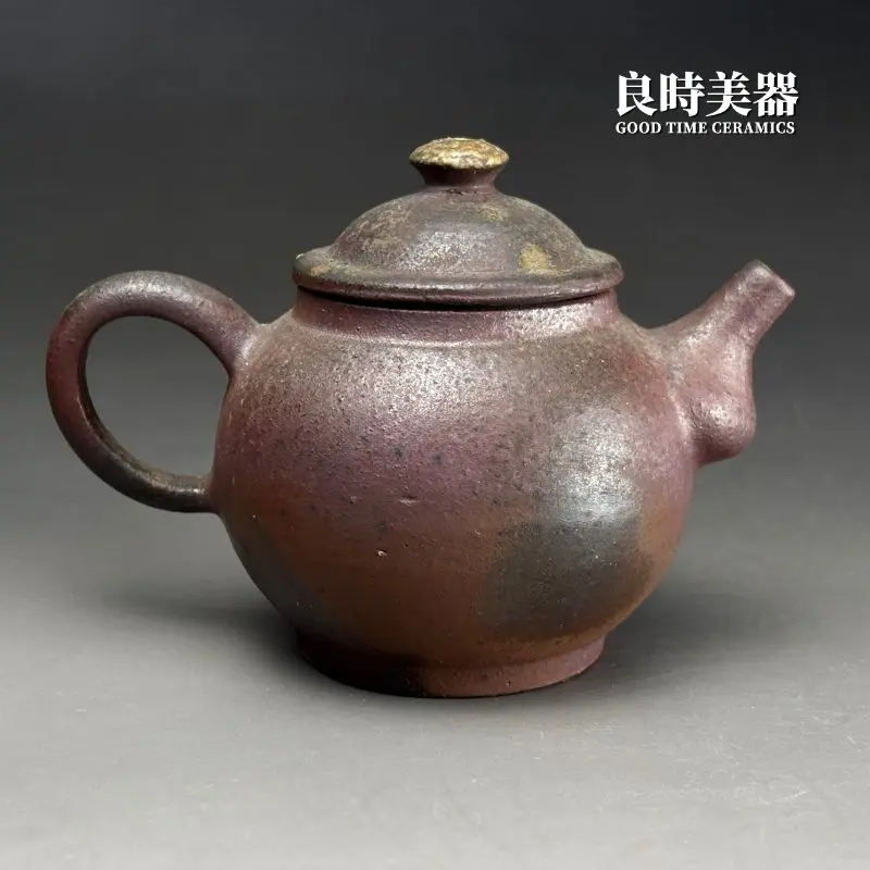 台灣茶器推薦-張家誌手作柴燒窯變龍蛋壺耳形圓把與背面細節